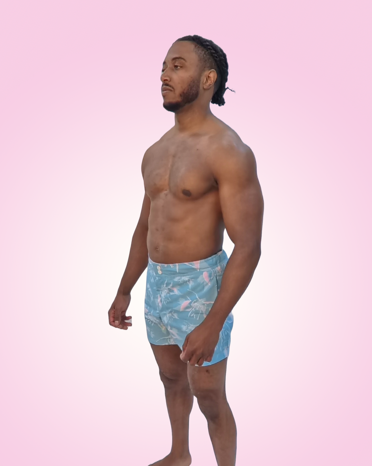 Wide shot of model wearing KIKOKAI Blue Angel Print Swim Shorts